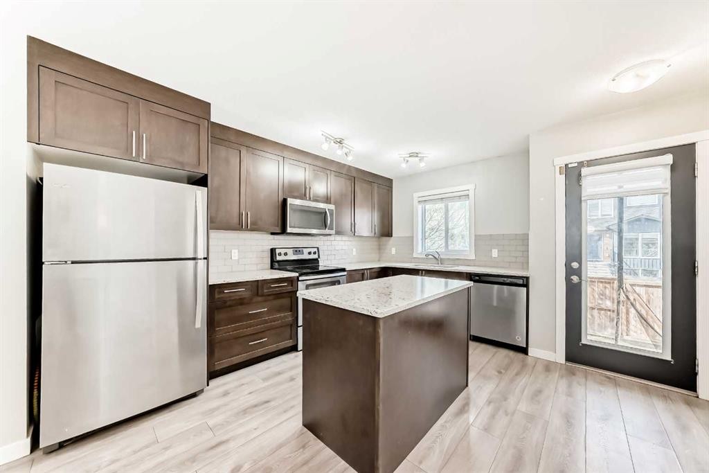 228 Red Embers Way Ne, Calgary, AB - Indoor Photo Showing Kitchen With Stainless Steel Kitchen With Upgraded Kitchen