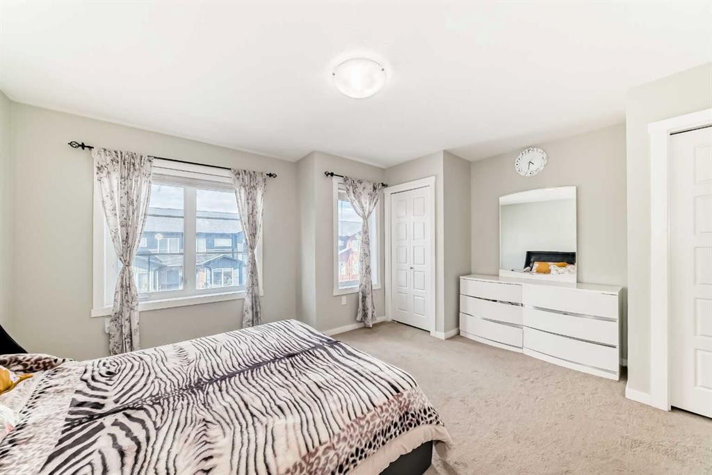 228 Red Embers Way Ne, Calgary, AB - Indoor Photo Showing Bedroom