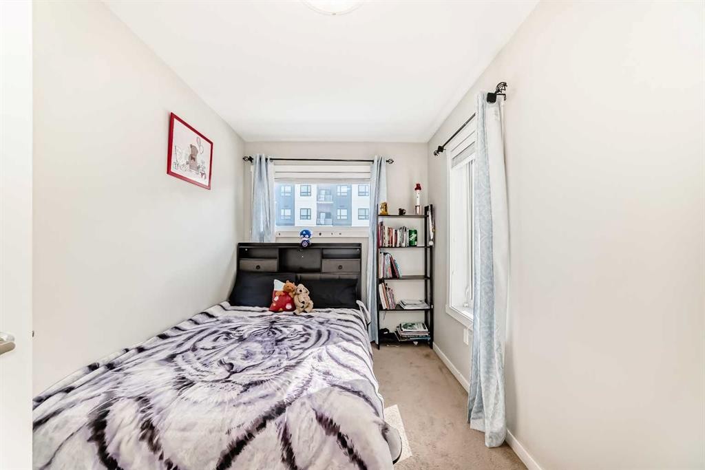 228 Red Embers Way Ne, Calgary, AB - Indoor Photo Showing Bedroom
