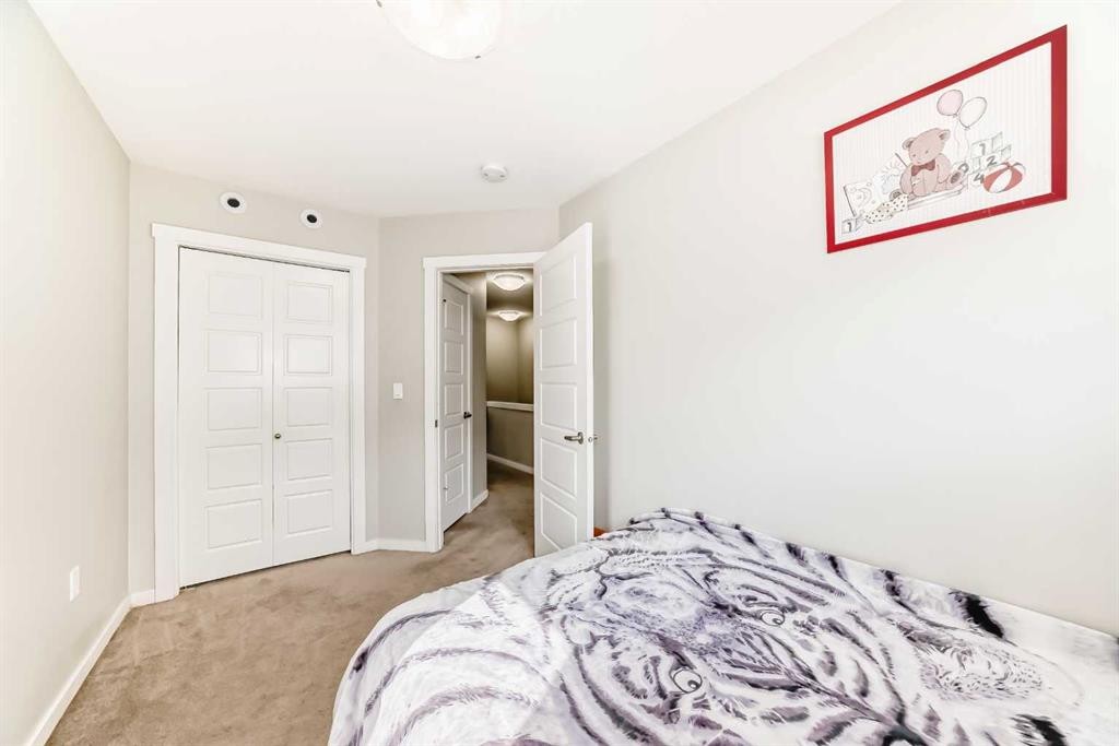 228 Red Embers Way Ne, Calgary, AB - Indoor Photo Showing Bedroom