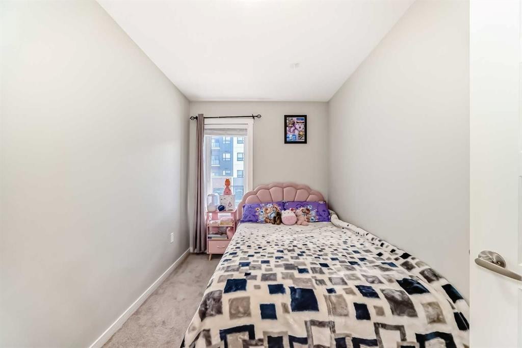 228 Red Embers Way Ne, Calgary, AB - Indoor Photo Showing Bedroom