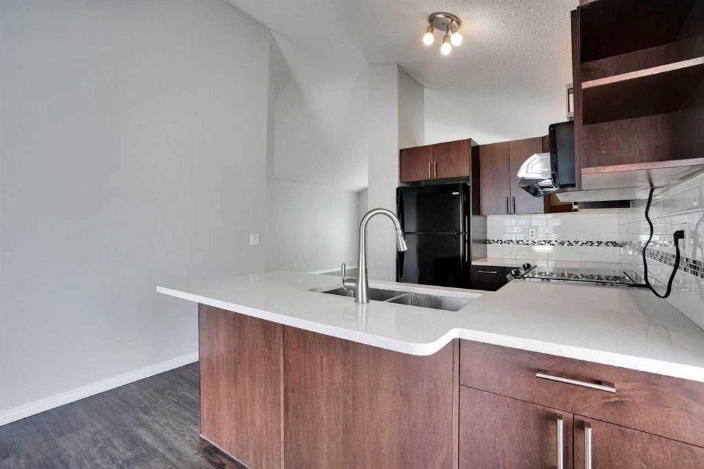 42 Harvest Rose Circle Ne, Calgary, AB - Indoor Photo Showing Kitchen With Double Sink