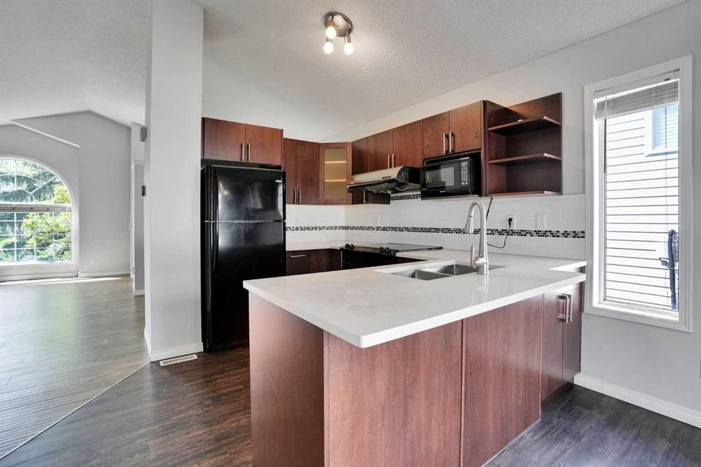 42 Harvest Rose Circle Ne, Calgary, AB - Indoor Photo Showing Kitchen With Double Sink