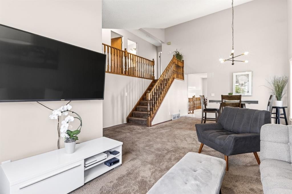 235 Deerview Drive Se, Calgary, AB - Indoor Photo Showing Living Room
