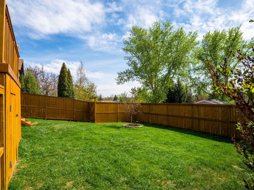 235 Deerview Drive Se, Calgary, AB - Outdoor With Backyard