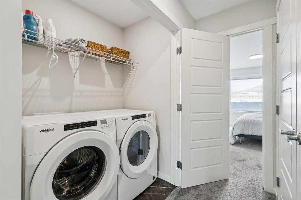 201 Vantage Drive, Cochrane, AB - Indoor Photo Showing Laundry Room