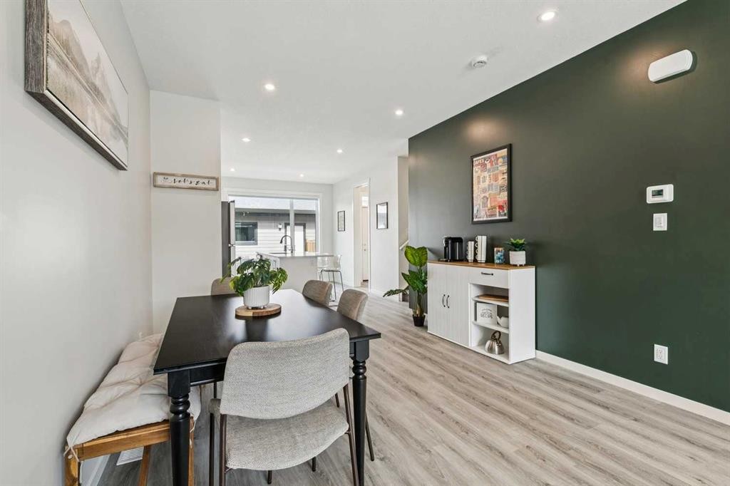 201 Vantage Drive, Cochrane, AB - Indoor Photo Showing Dining Room