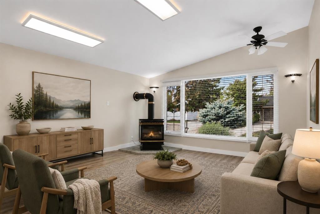 332 Wascana Crescent Se, Calgary, AB - Indoor Photo Showing Living Room With Fireplace