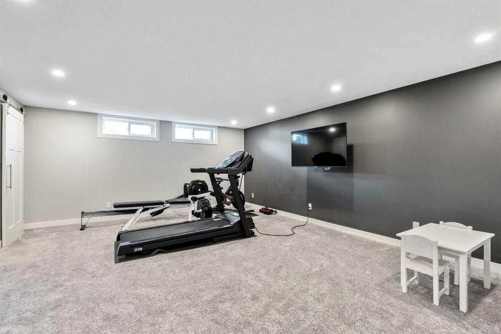 6007 34 Street Sw, Calgary, AB - Indoor Photo Showing Gym Room