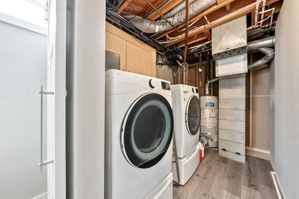 6007 34 Street Sw, Calgary, AB - Indoor Photo Showing Laundry Room