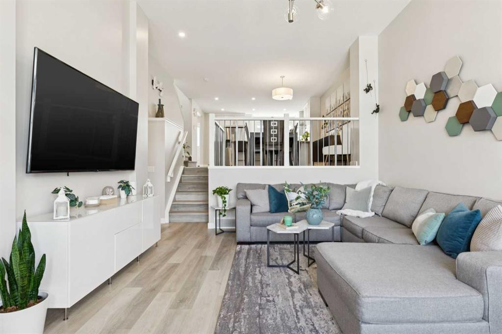 303 Masters Row Se, Calgary, AB - Indoor Photo Showing Living Room