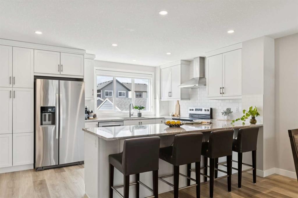 303 Masters Row Se, Calgary, AB - Indoor Photo Showing Kitchen With Upgraded Kitchen