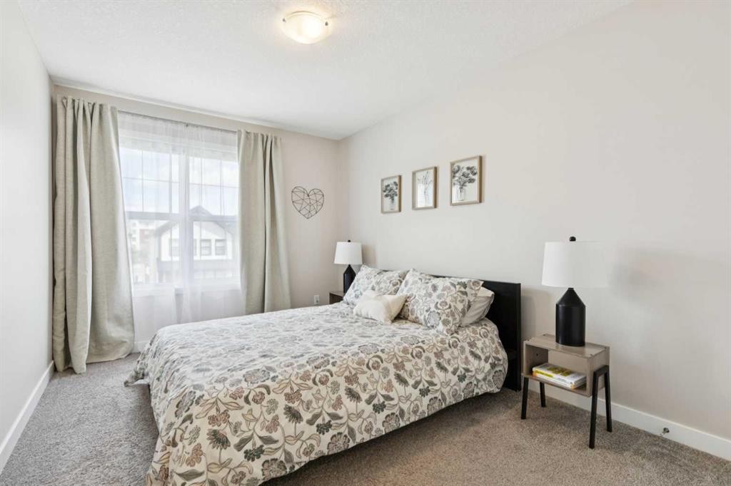 303 Masters Row Se, Calgary, AB - Indoor Photo Showing Bedroom