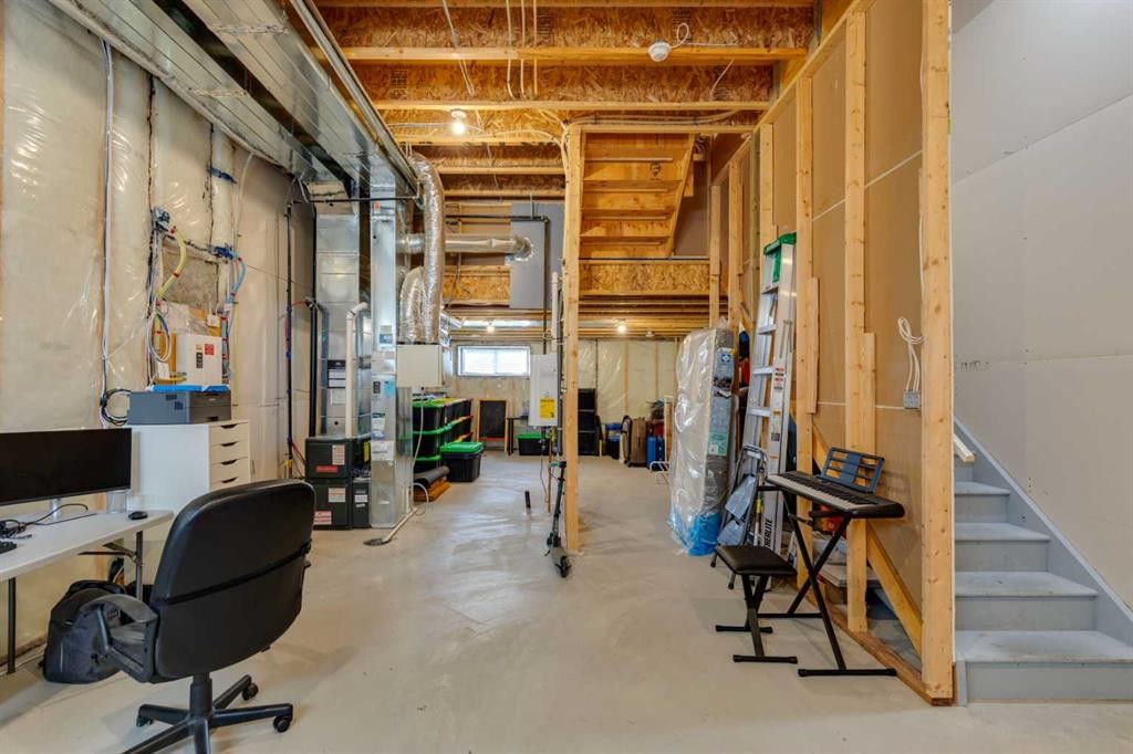 303 Masters Row Se, Calgary, AB - Indoor Photo Showing Basement