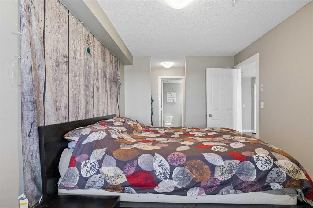 305-355 Taralake Way Ne, Calgary, AB - Indoor Photo Showing Bedroom