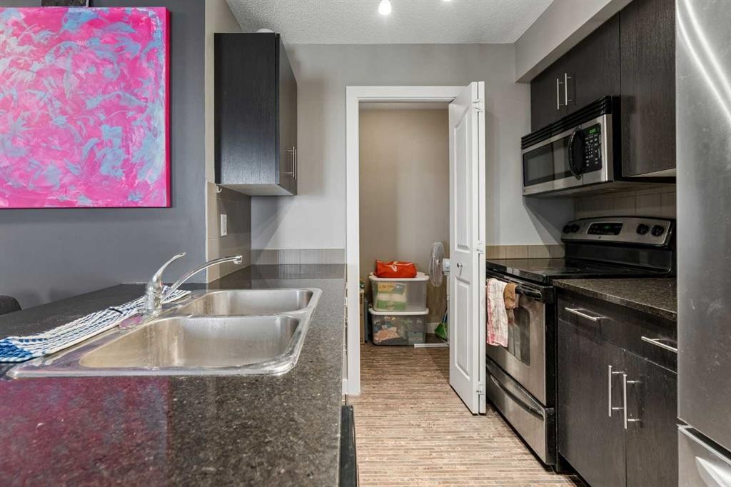 305-355 Taralake Way Ne, Calgary, AB - Indoor Photo Showing Kitchen With Double Sink