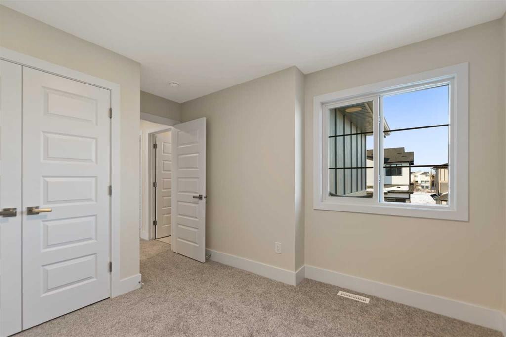 185 South Shore View, Chestermere, AB - Indoor Photo Showing Other Room