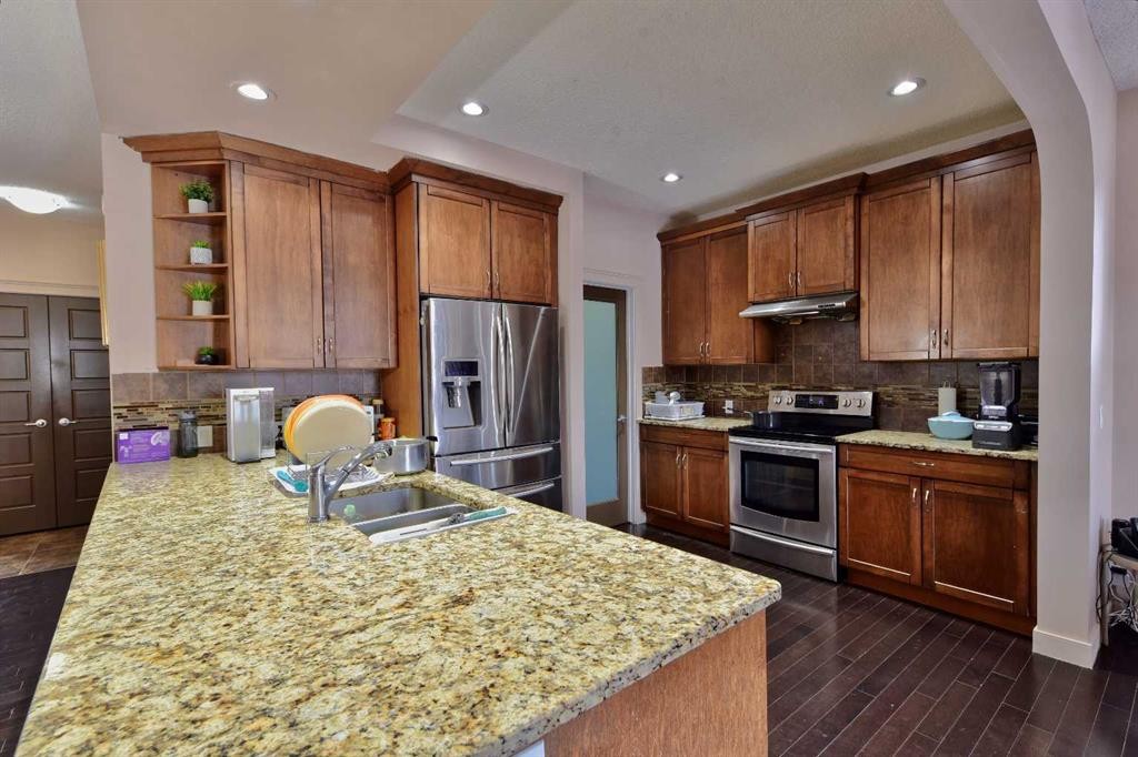 18 Redstone Manor Ne, Calgary, AB - Indoor Photo Showing Kitchen With Double Sink