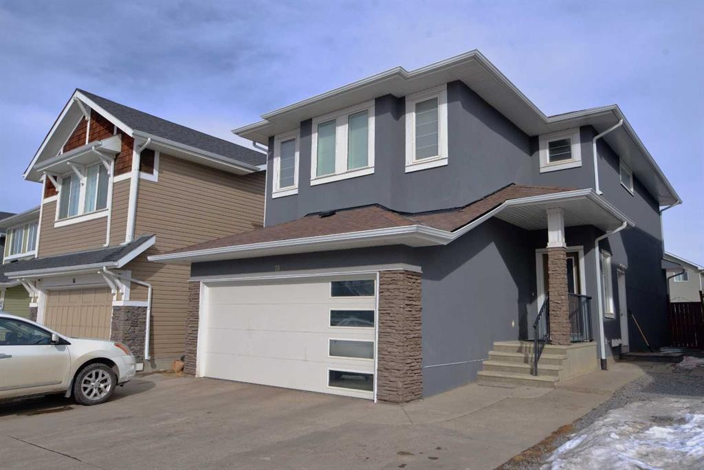 18 Redstone Manor Ne, Calgary, AB - Outdoor With Facade