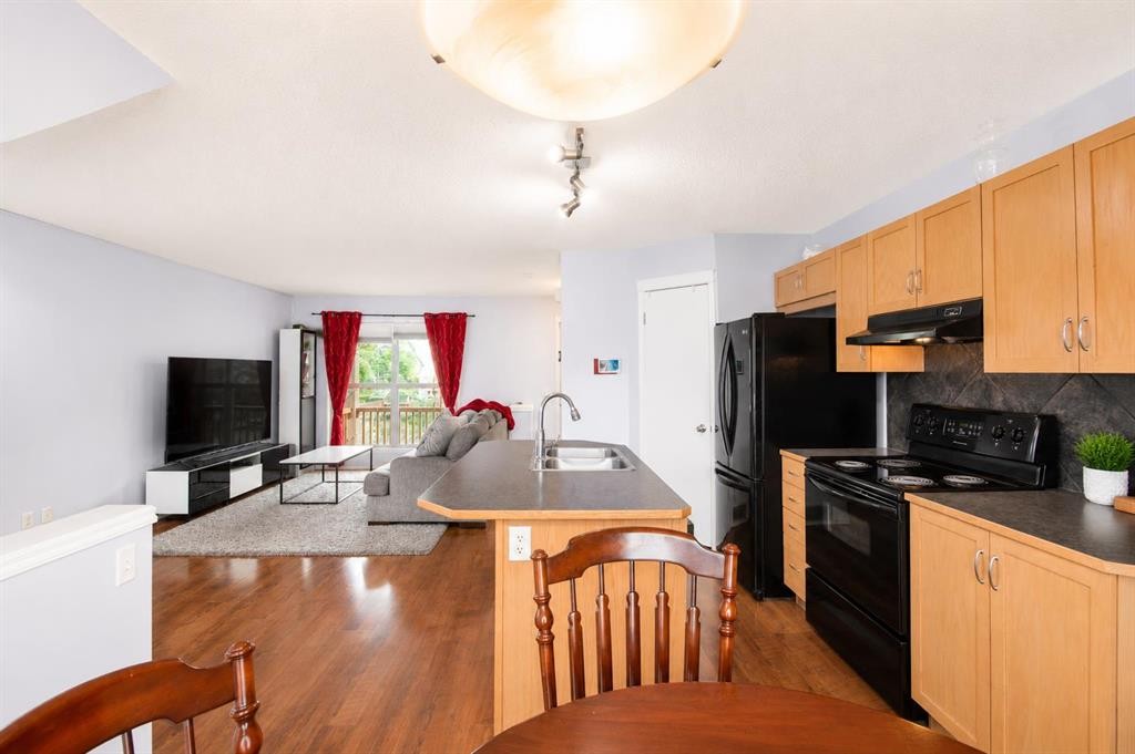 168 Prestwick Heights Se, Calgary, AB - Indoor Photo Showing Kitchen With Double Sink