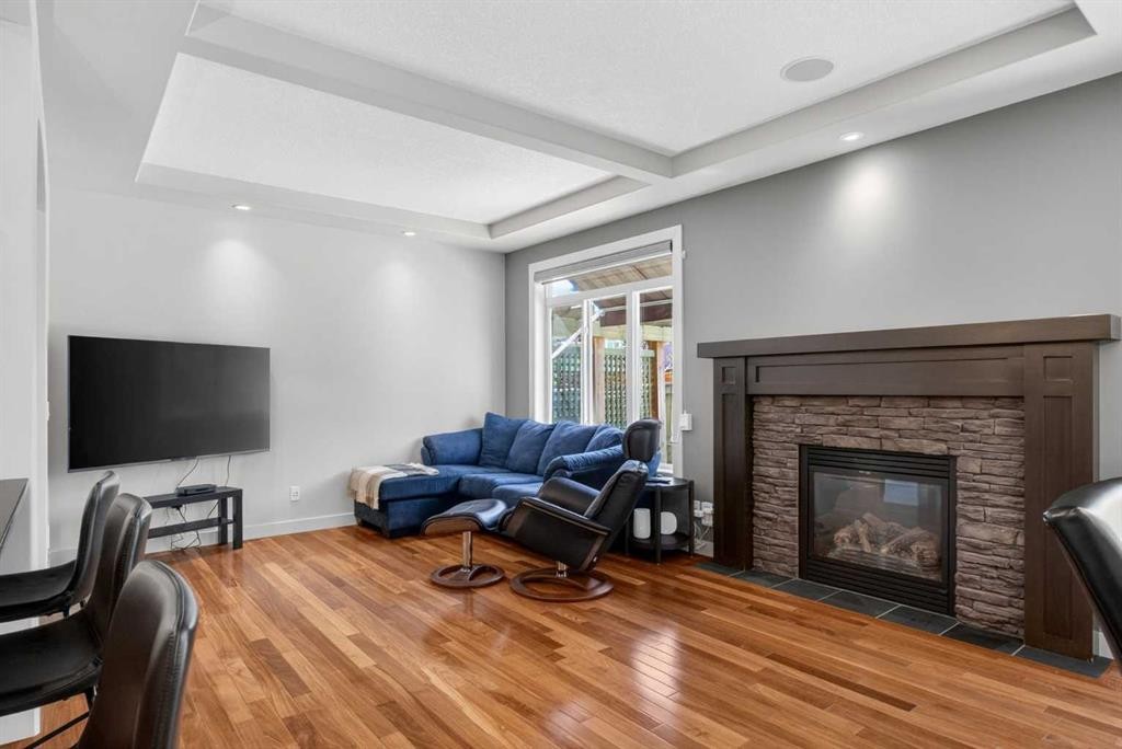 30 Cranarch Circle Se, Calgary, AB - Indoor Photo Showing Living Room With Fireplace