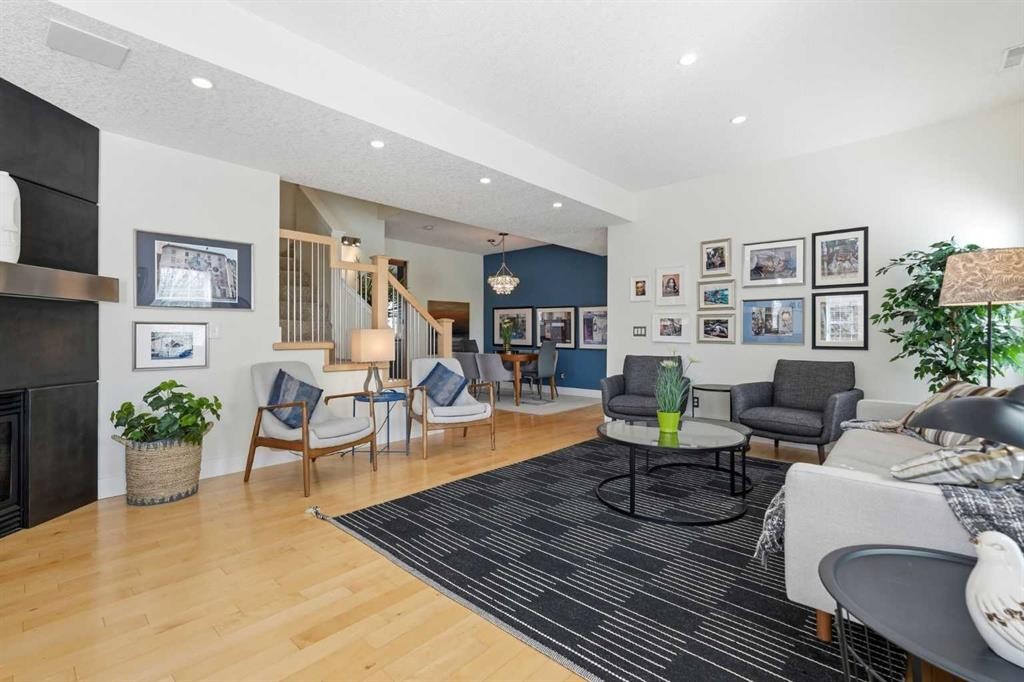 130 Garrison Square Sw, Calgary, AB - Indoor Photo Showing Living Room With Fireplace