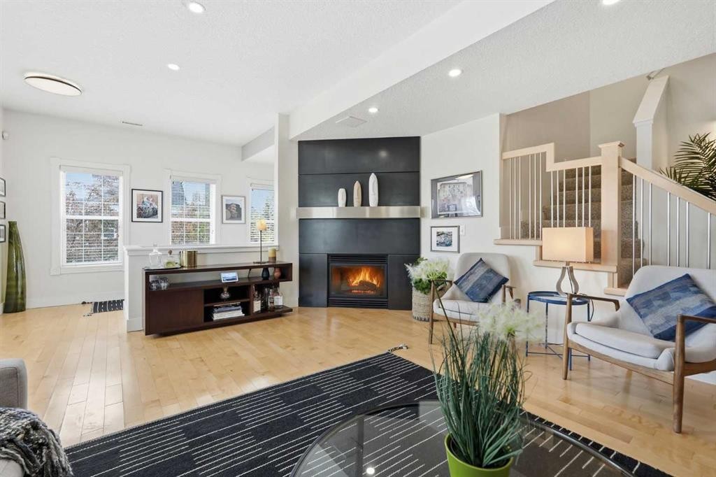 130 Garrison Square Sw, Calgary, AB - Indoor Photo Showing Other Room With Fireplace