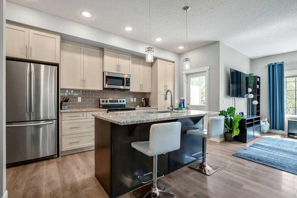 219 Mahogany Grove Se, Calgary, AB - Indoor Photo Showing Kitchen With Stainless Steel Kitchen With Upgraded Kitchen
