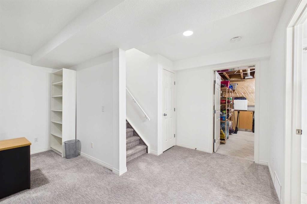 144 Simcoe Place Sw, Calgary, AB - Indoor Photo Showing Other Room