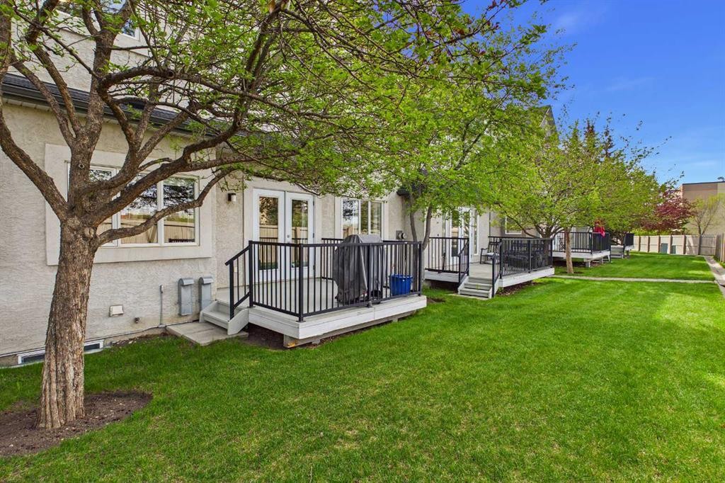 144 Simcoe Place Sw, Calgary, AB - Outdoor With Deck Patio Veranda