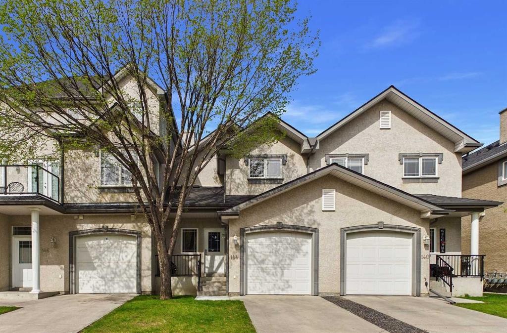 144 Simcoe Place Sw, Calgary, AB - Outdoor With Facade