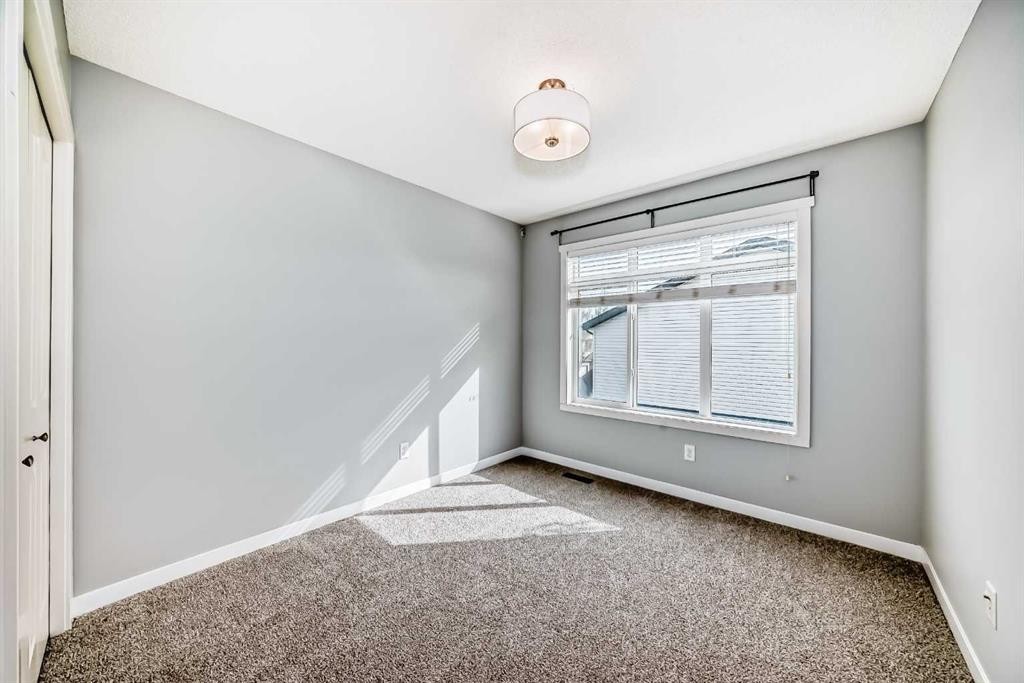 76 Copperpond Landing Se, Calgary, AB - Indoor Photo Showing Other Room