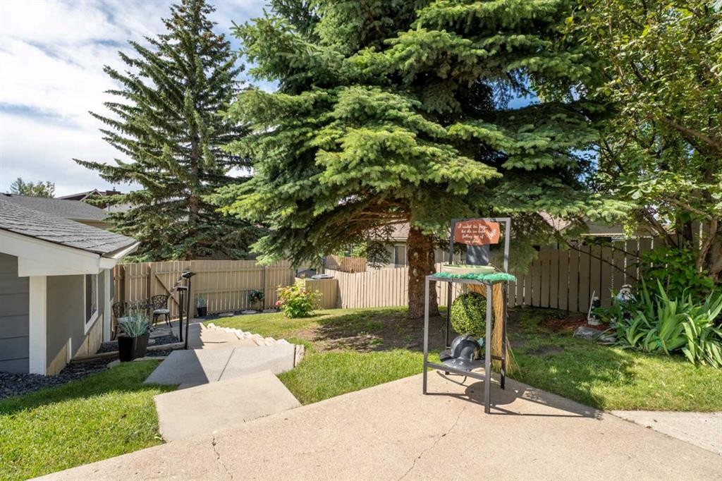 49 Lock Crescent, Okotoks, AB - Outdoor With Backyard