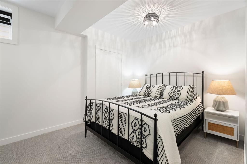 75 Sundown Crescent, Cochrane, AB - Indoor Photo Showing Bedroom