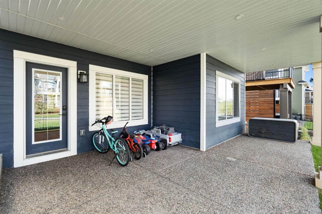 75 Sundown Crescent, Cochrane, AB - Outdoor With Deck Patio Veranda With Exterior