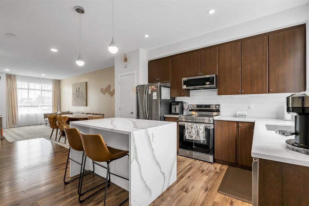 300 Copperstone Cove Se, Calgary, AB - Indoor Photo Showing Kitchen With Stainless Steel Kitchen With Upgraded Kitchen
