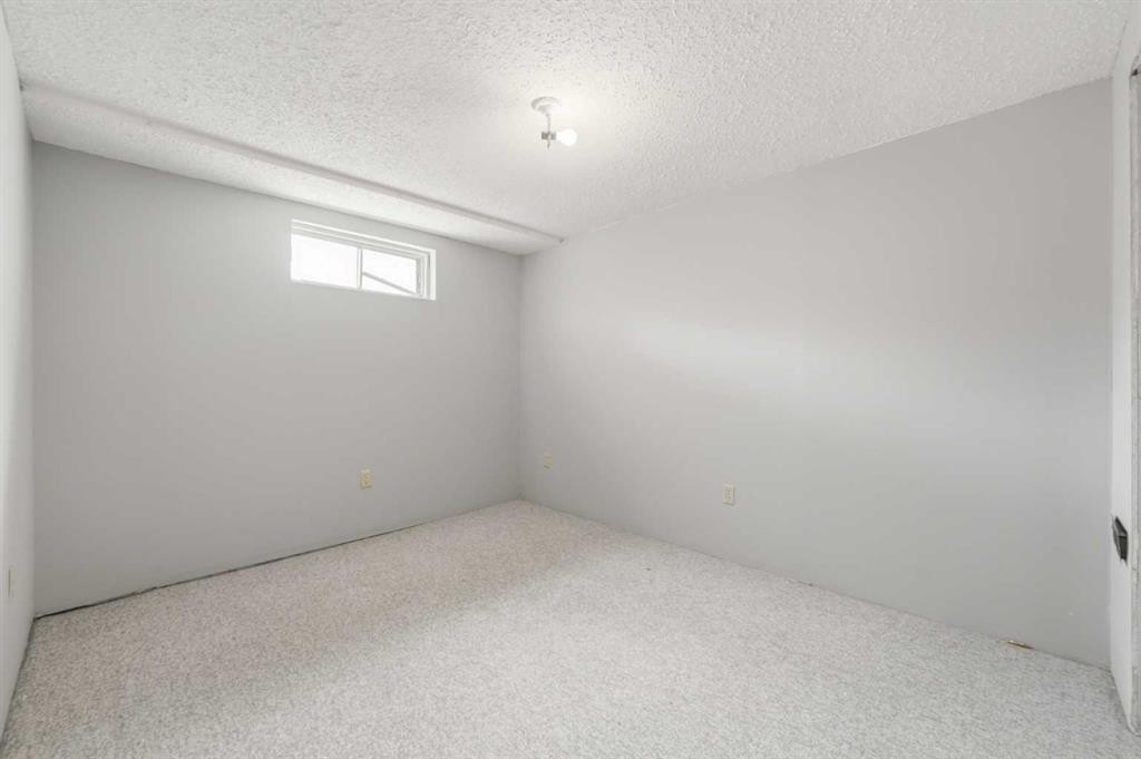 85 Cedarwood Hill Sw, Calgary, AB - Indoor Photo Showing Other Room