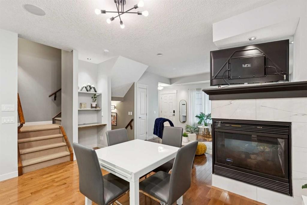 1-528 34 Street Nw, Calgary, AB - Indoor With Fireplace
