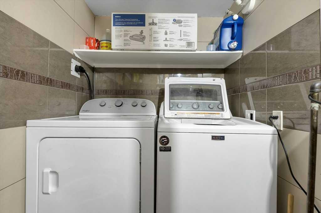 155 Midcrest Crescent Se, Calgary, AB - Indoor Photo Showing Laundry Room