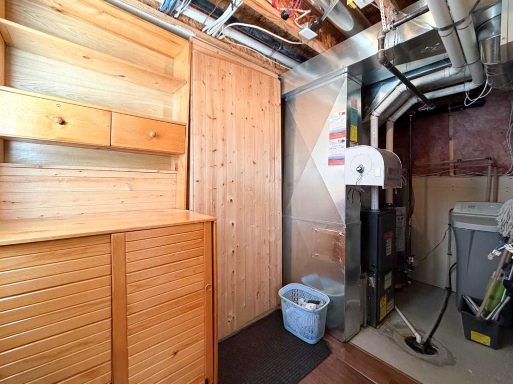 117 Panatella Hill Nw, Calgary, AB - Indoor Photo Showing Basement