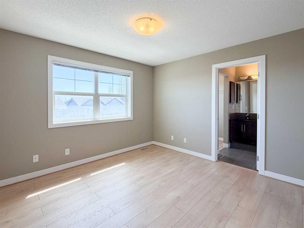117 Panatella Hill Nw, Calgary, AB - Indoor Photo Showing Other Room