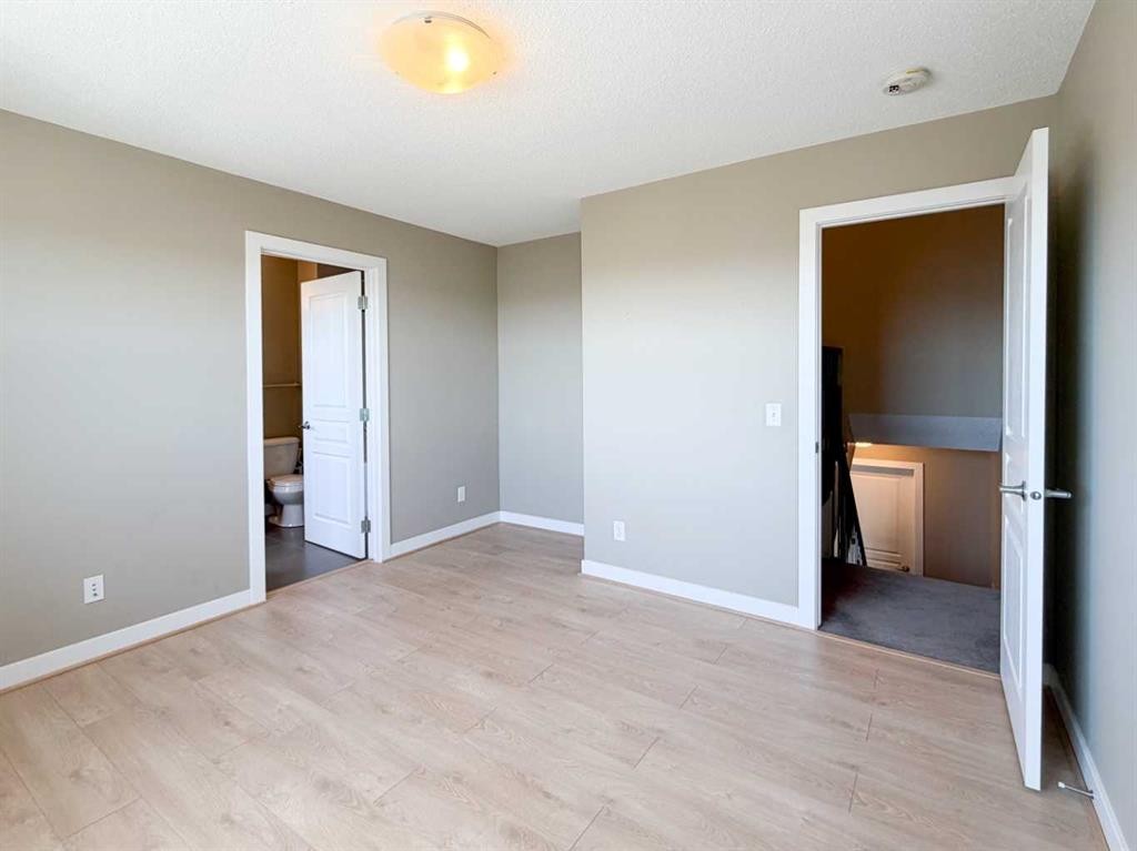 117 Panatella Hill Nw, Calgary, AB - Indoor Photo Showing Other Room
