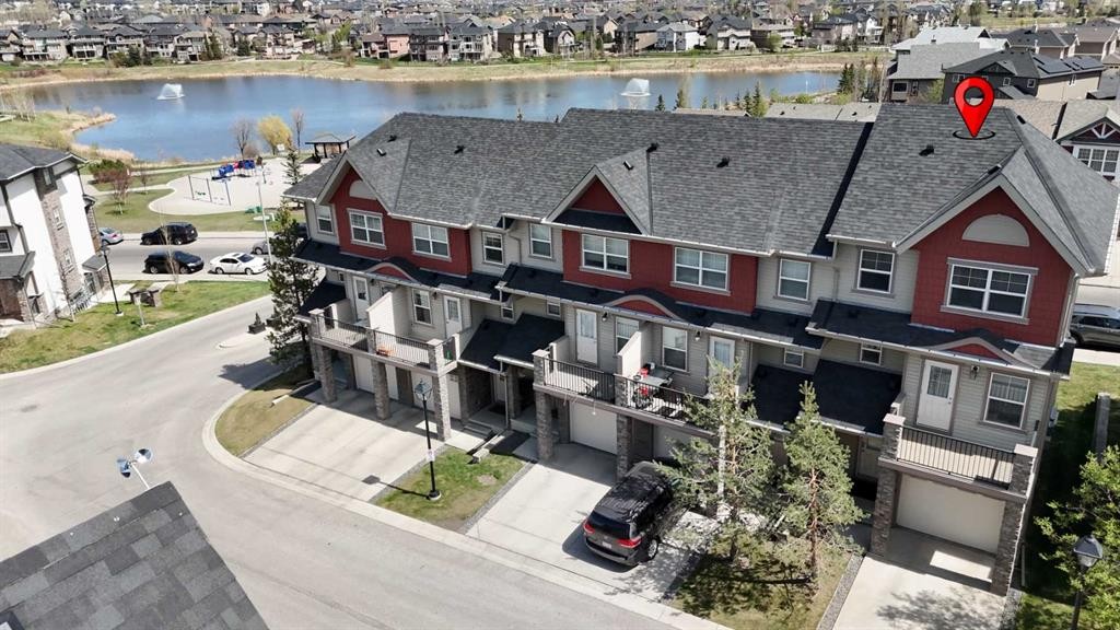 117 Panatella Hill Nw, Calgary, AB - Outdoor With Body Of Water