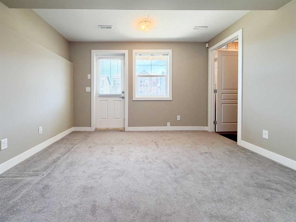 117 Panatella Hill Nw, Calgary, AB - Indoor Photo Showing Other Room