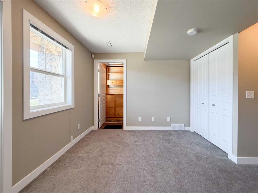 117 Panatella Hill Nw, Calgary, AB - Indoor Photo Showing Other Room