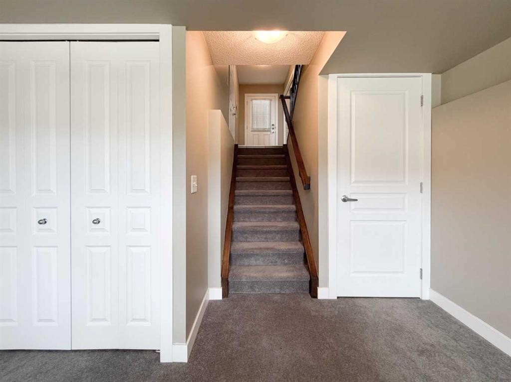 117 Panatella Hill Nw, Calgary, AB - Indoor Photo Showing Other Room