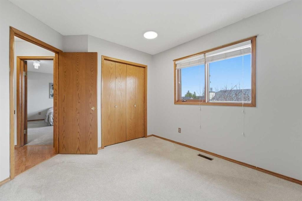 109 Downey Place, Okotoks, AB - Indoor Photo Showing Other Room