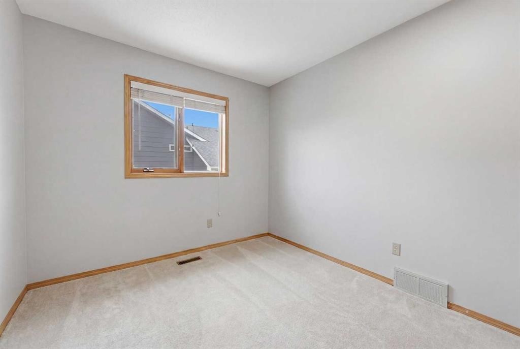 109 Downey Place, Okotoks, AB - Indoor Photo Showing Other Room