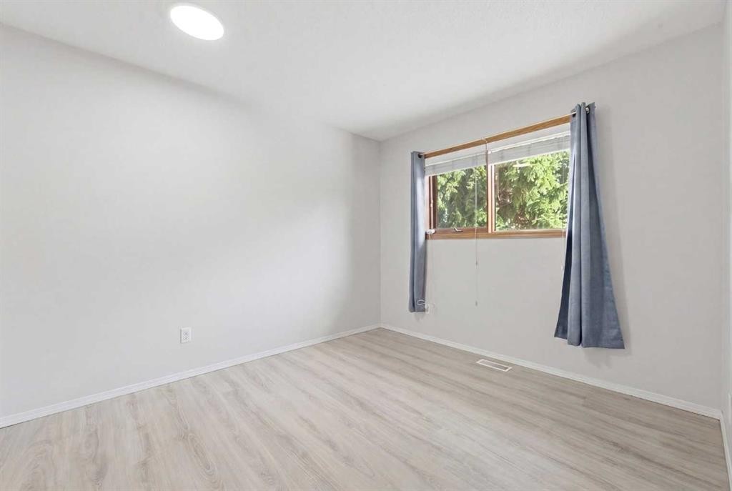 109 Downey Place, Okotoks, AB - Indoor Photo Showing Other Room
