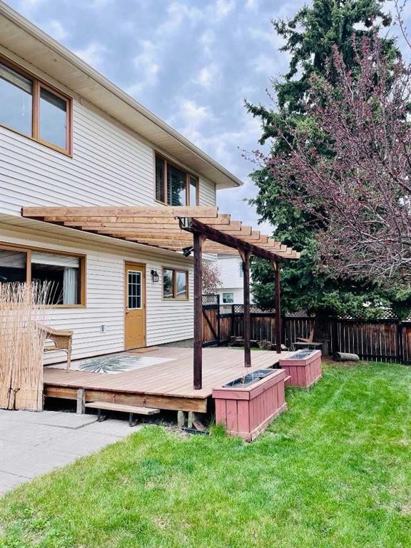 109 Downey Place, Okotoks, AB - Outdoor With Deck Patio Veranda